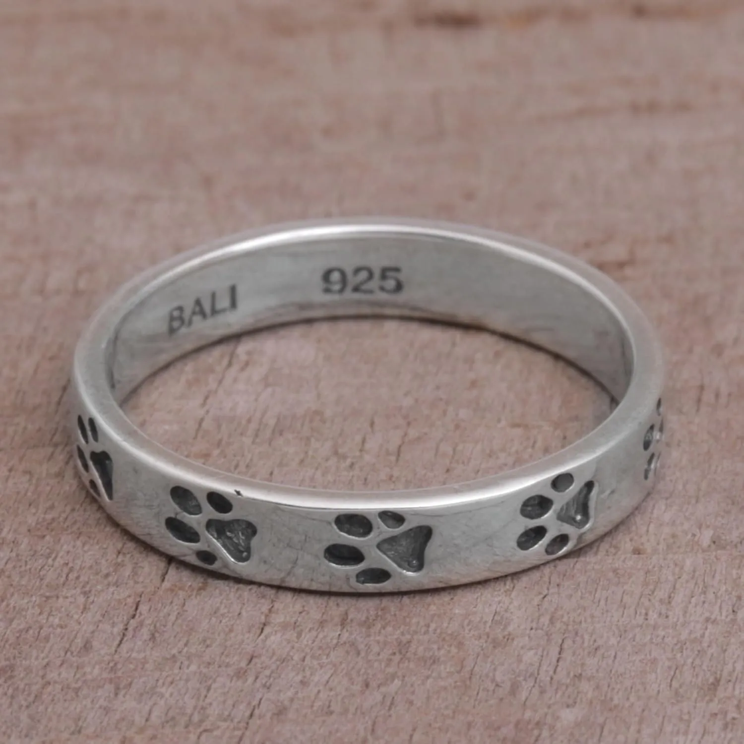 NOVICA Artisan Handmade .925 Sterling Silver Band Ring Paw Print Motif from Bali Indonesia Animal Themed Modern Dog 'Paw Prints'